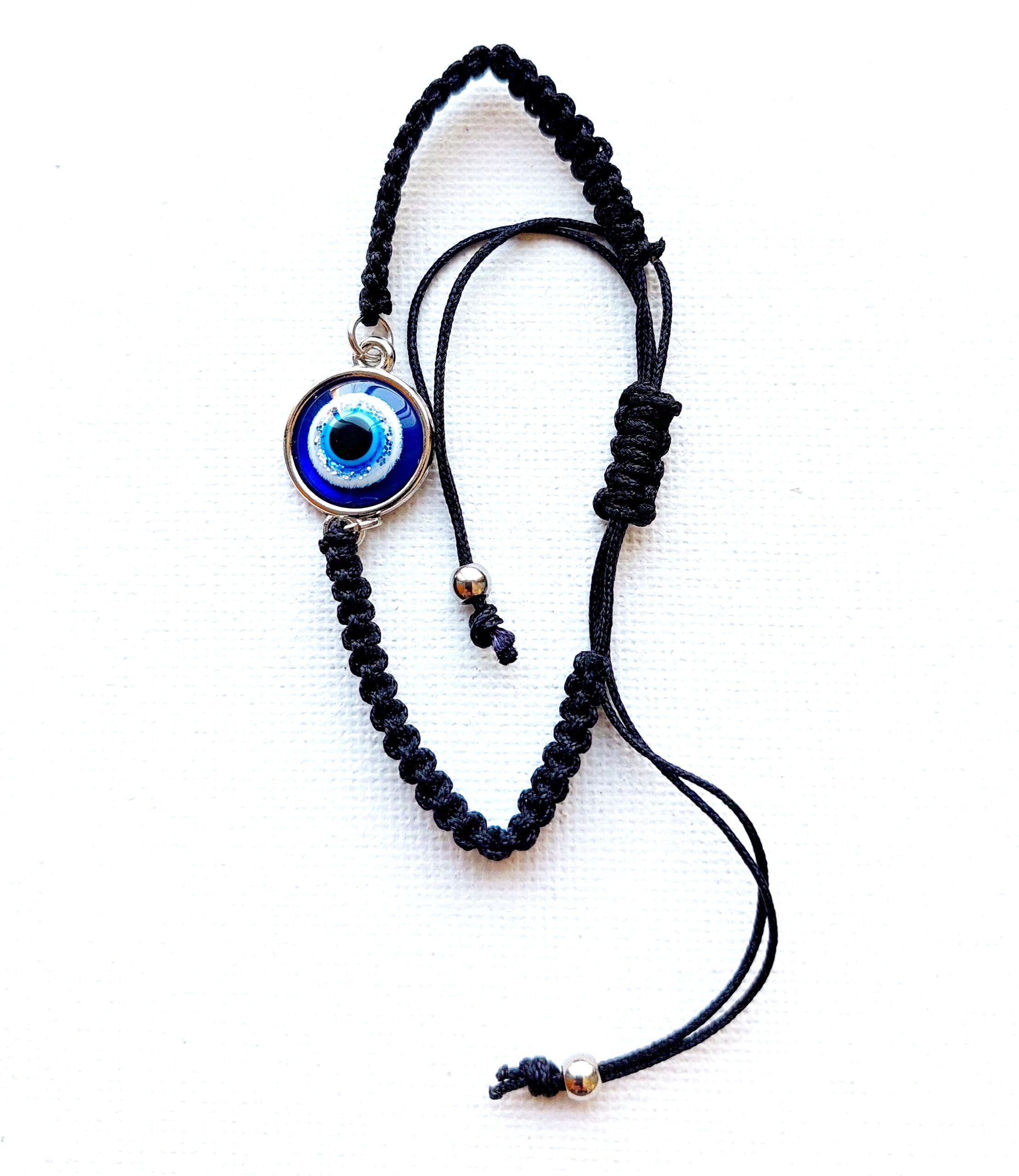 Pulsera ajustable de hilo negro y ojo turco