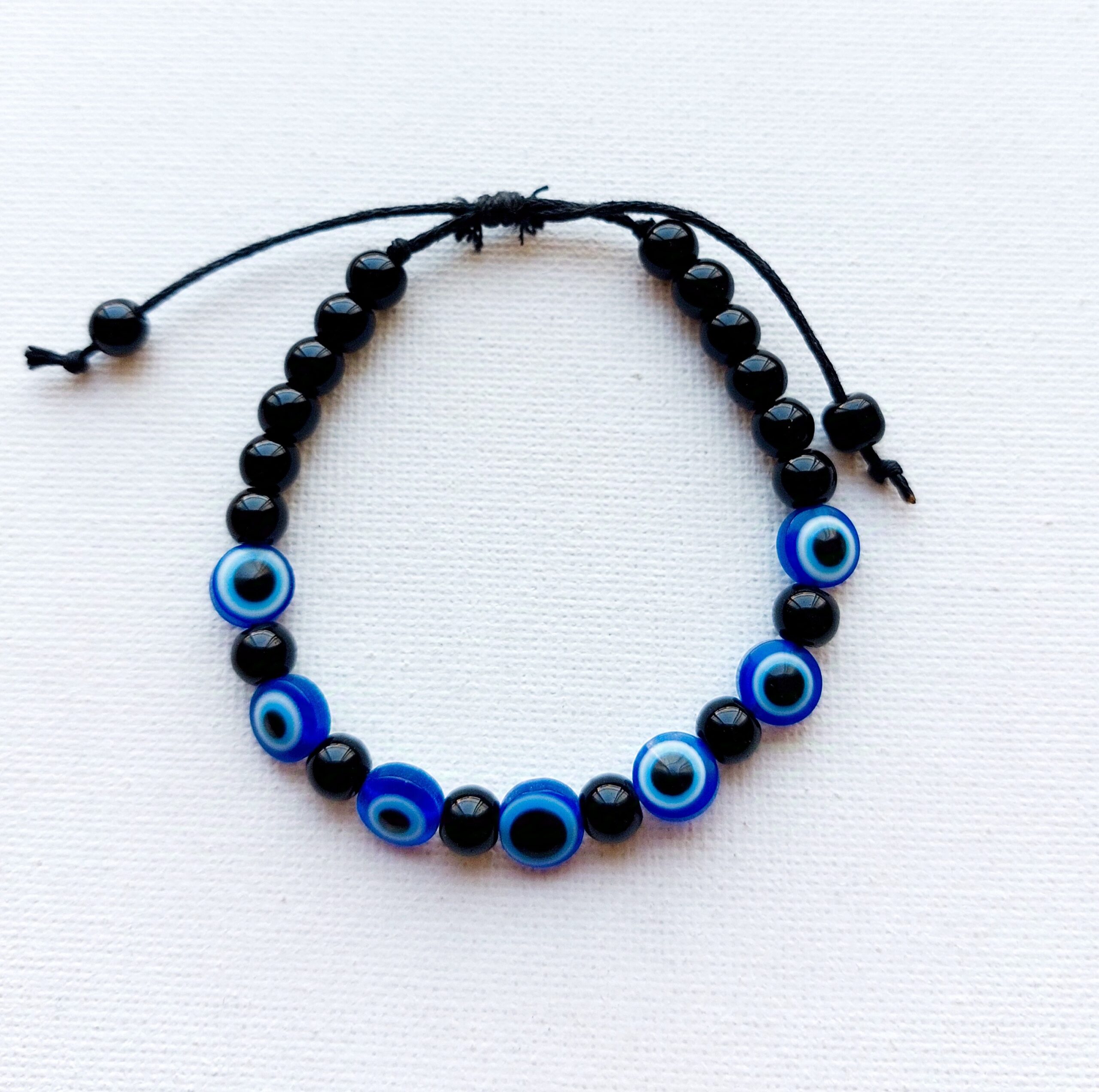 Pulsera ajustable de ojo turco con piedras negras