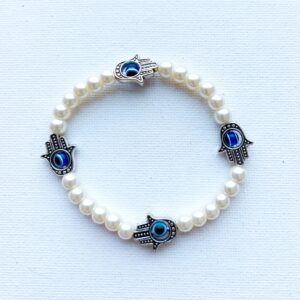 Pulsera elástica de Ojo Turco y mano de Fátima con perlas